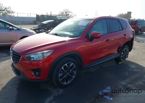 2016 Mazda Cx-5 Grand Touring z USA, uszkodzony, nr VIN JM3KE2DY5G0787857